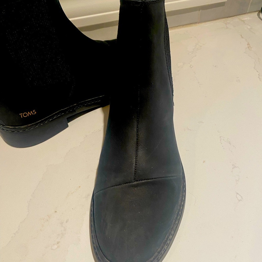 Women’s black Tom’s boot in size 8. Non smoker home. Like new!